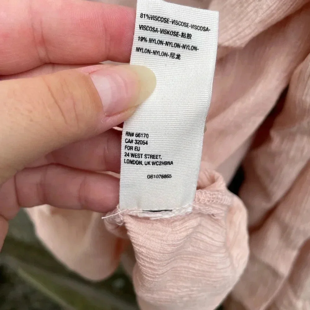 FREE PEOPLE CHECK ON IT FAUX WRAP TOP